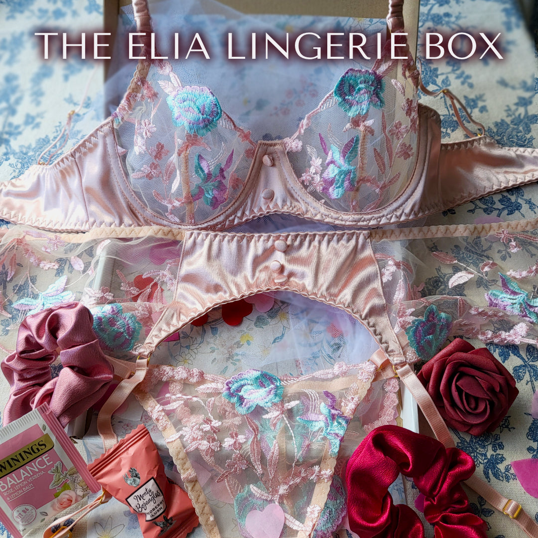 lingerie subscription box main product image with pink set and gifts